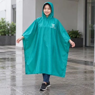 Minh họa người mặc poncho xanh ngọc in nhận diện TS TRUONG SON màu trắng