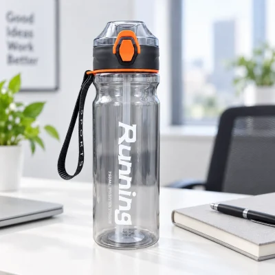 Minh họa bình nước750 ml nắp đen cam bên sổ và bút tại bàn