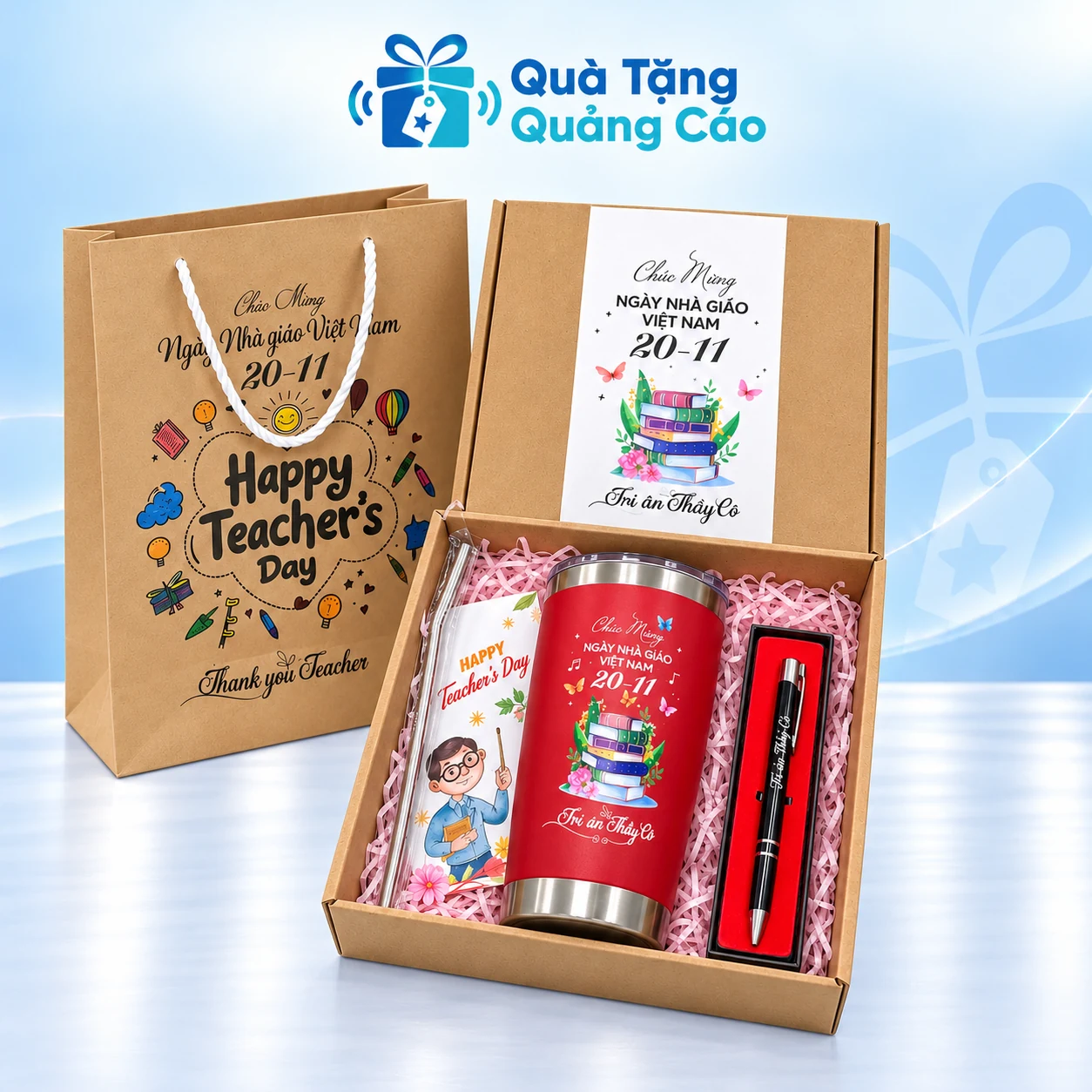 Minh họa bộ ly đỏ và bút kim loại trong hộp quà 20/11 Minh họa ly đỏ 500ml và bút đen trong hộp giấy lót hồng, kèm thiệp và túi giấy thầy cô