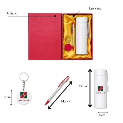 Tư liệu kích thước bình cao 19cm đường kính 6cm, bút dài 14,2cm và móc khóa tròn 5cm