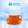 Cốc cà phê 250 ml kèm đĩa màu cam trên nền Quà Tặng Quảng Cáo