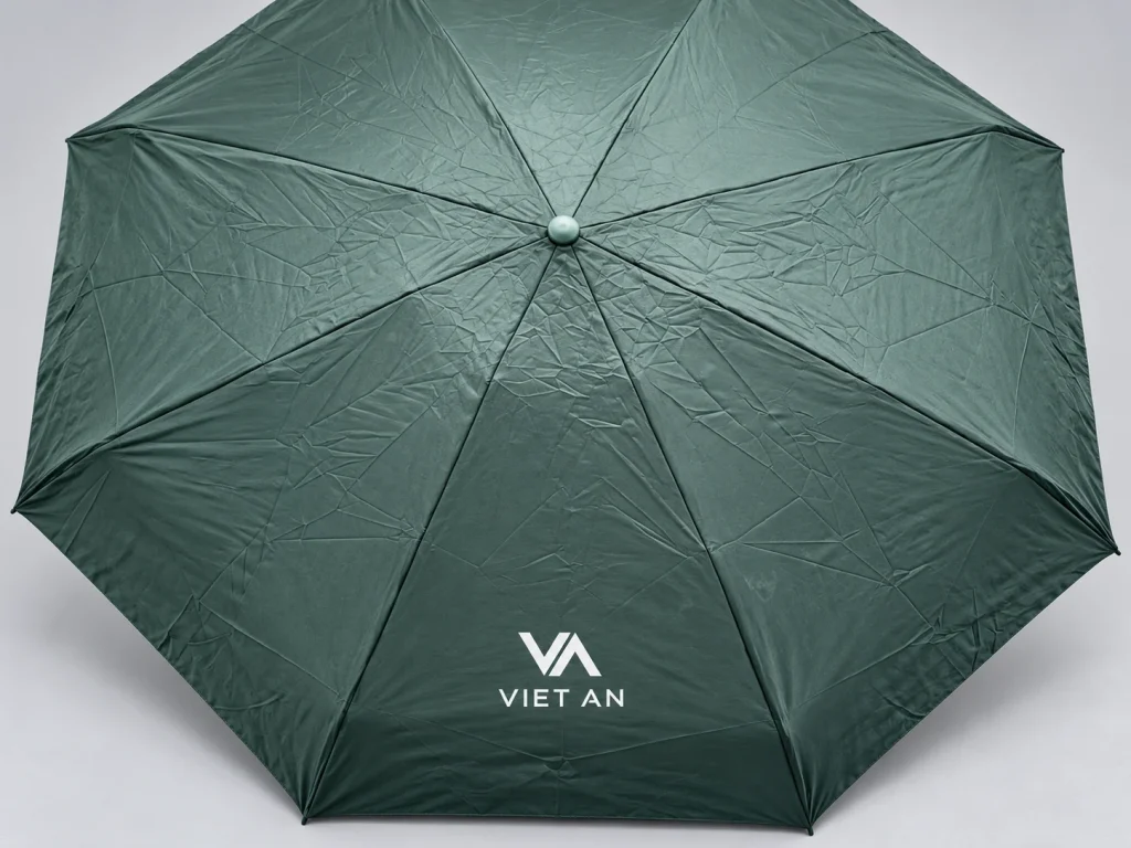 Mô phỏng logo VIET AN trên một múi ô xanh rêu