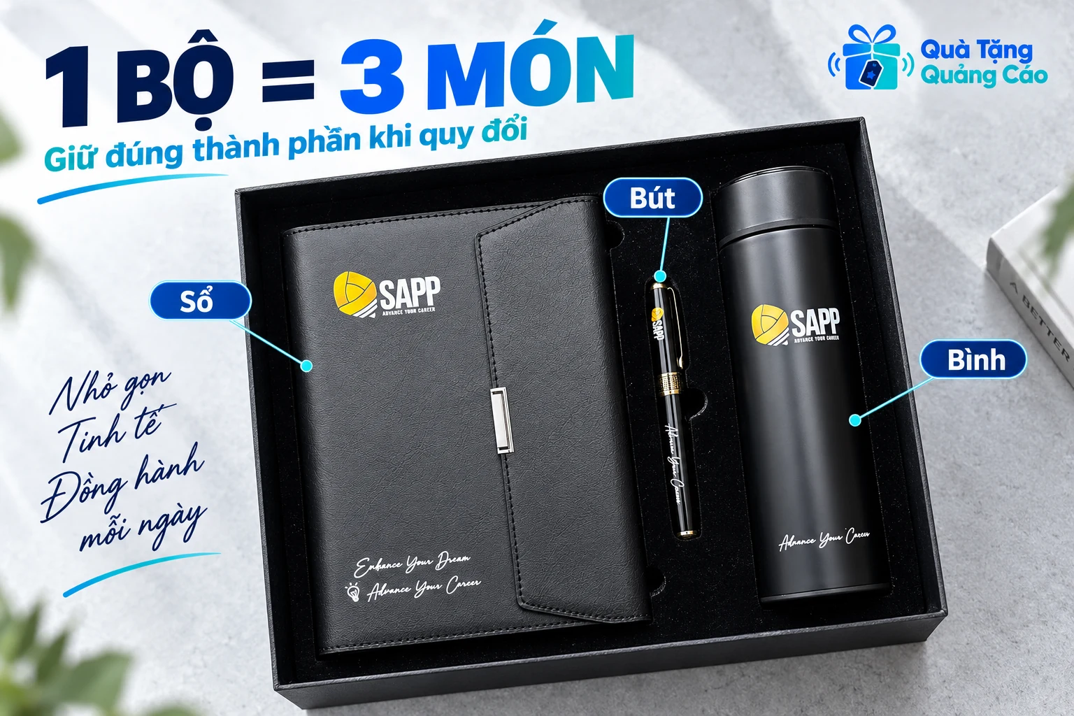 Một bộ gồm sổ, bút và bình được giữ nguyên trong hộp đen