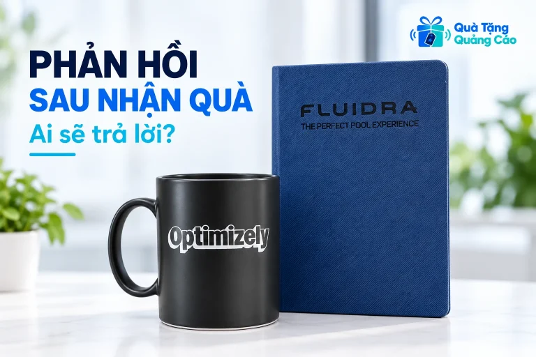 Sổ xanh FLUIDRA và cốc đen Optimizely cùng tiêu đề phản hồi sau nhận quà