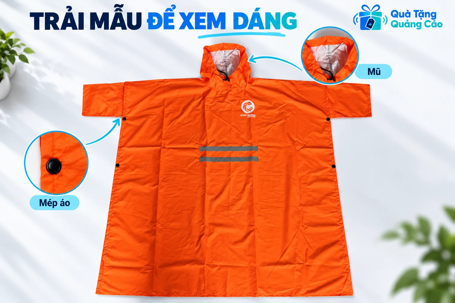 Áo mưa cam được trải hết để thấy thân dài, phần tay và mép có nút